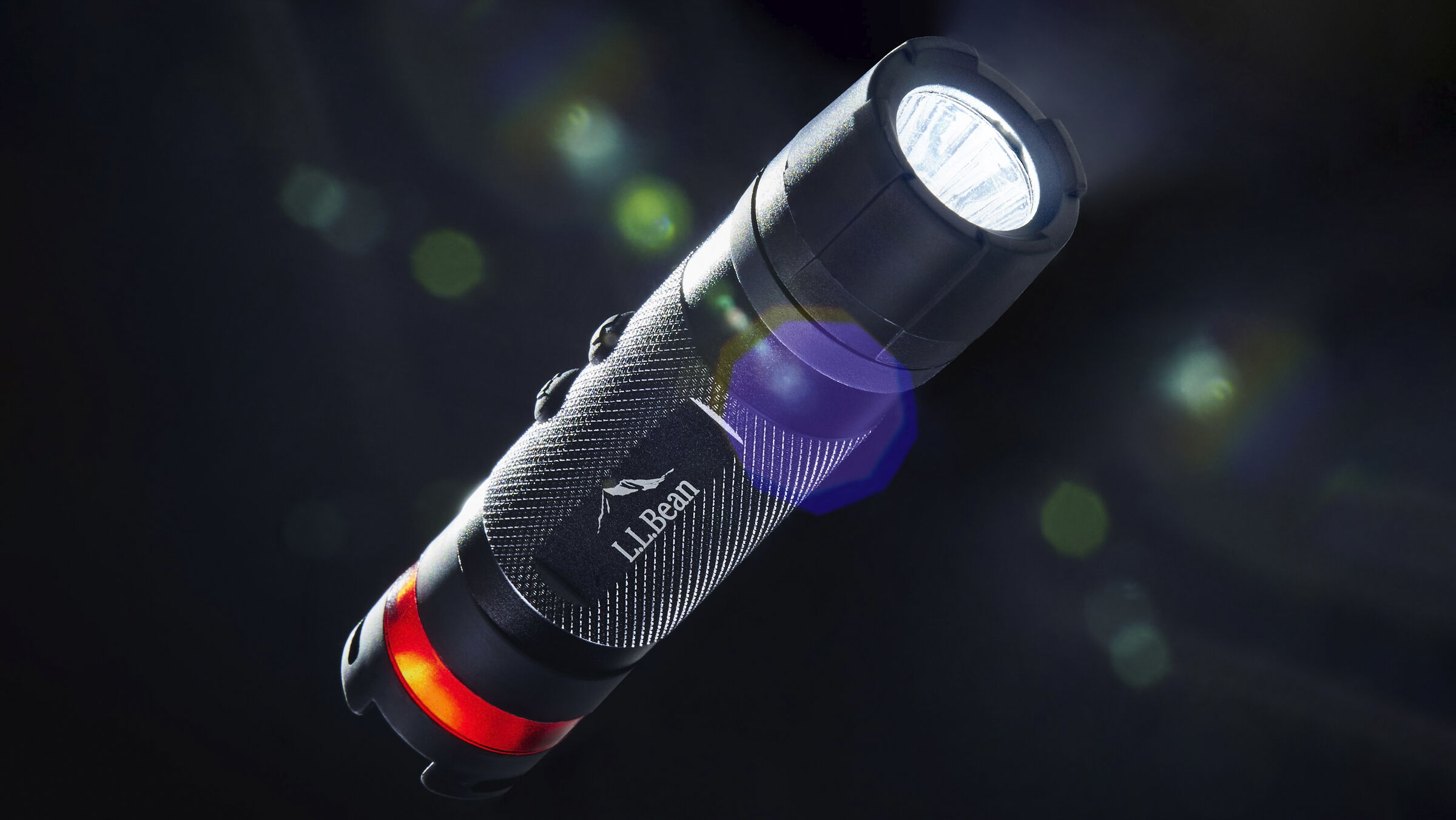 L.L.Bean flashlight, commercial product photography by Rory Scranton with dramatic backlighting.